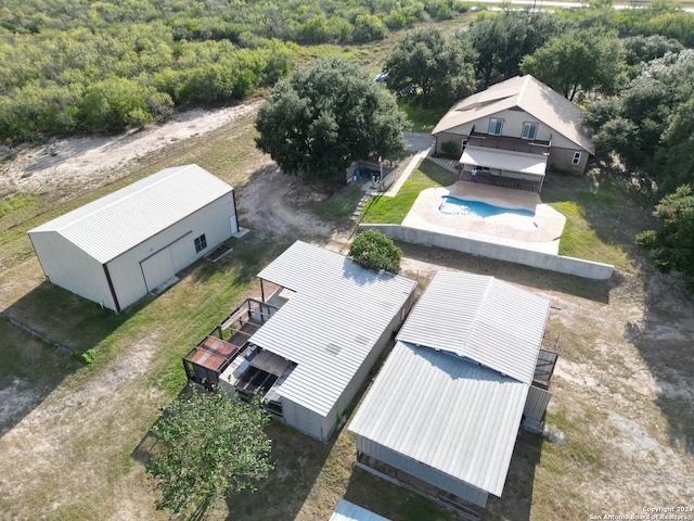 aerial view with a wooded view