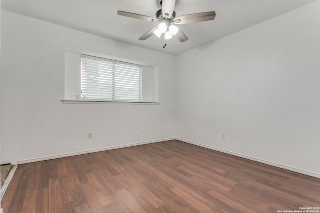 unfurnished room with ceiling fan and wood-type flooring