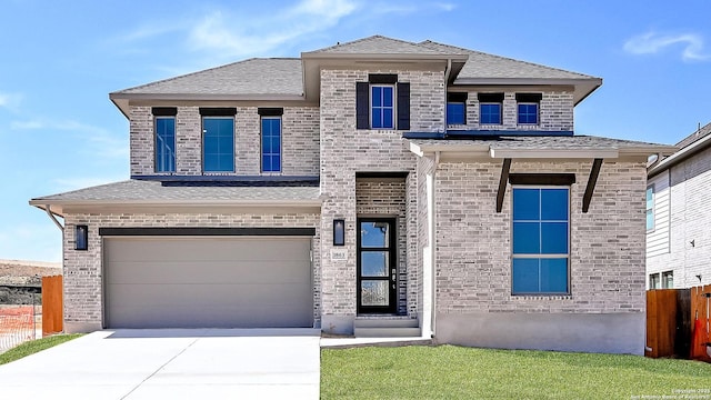 1863 Weinnacht, New Braunfels, TX 78132 - view of front of home featuring brick siding, an attached garage, and concrete driveway