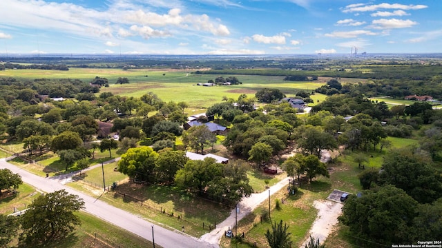 birds eye view of property featuring a rural view