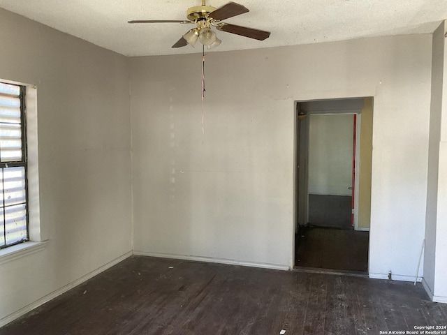5222 Lark, San Antonio, TX 78228 - unfurnished room featuring wood finished floors, a ceiling fan, and plenty of natural light