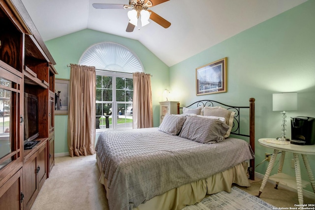 carpeted bedroom featuring ceiling fan and lofted ceiling