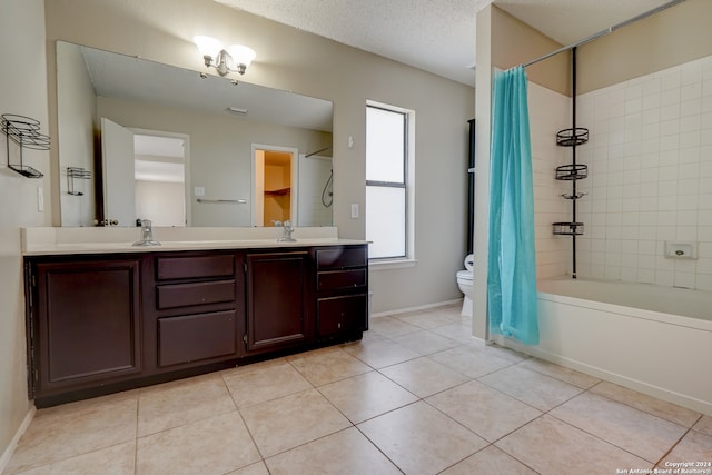 full bathroom featuring tile patterned floors, vanity, toilet, and shower / tub combo with curtain