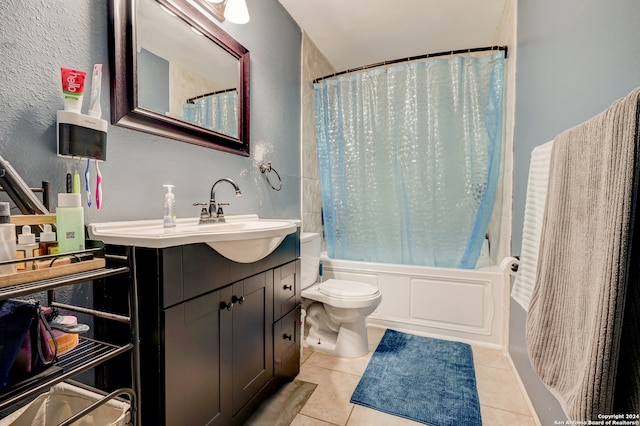 full bathroom with tile patterned floors, vanity, shower / bath combo, and toilet