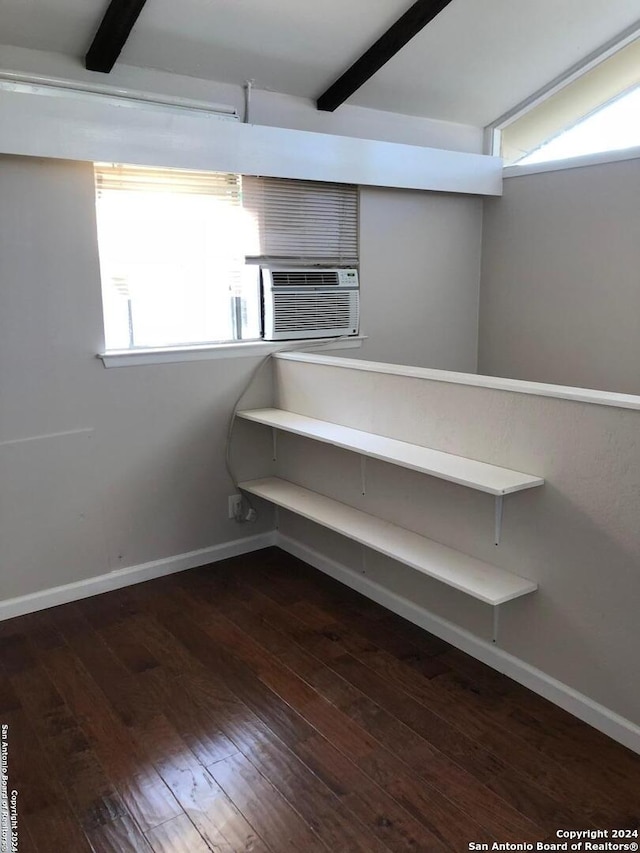 basement with cooling unit and dark wood-type flooring