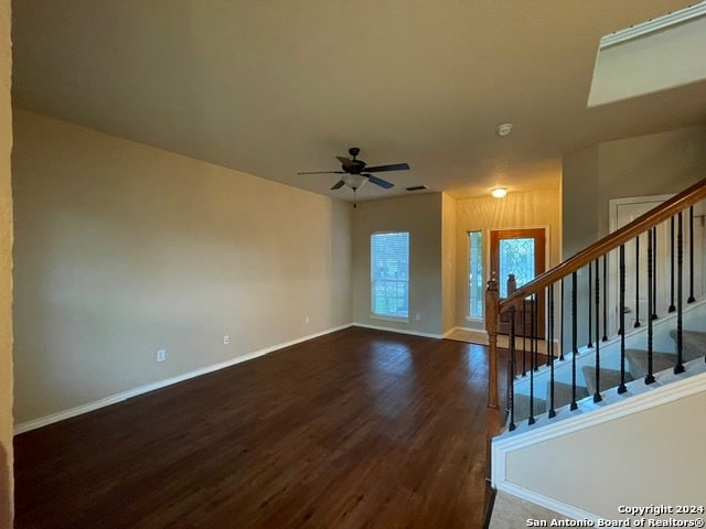 foyer featuring dark hardwood / wood-style floors and ceiling fan