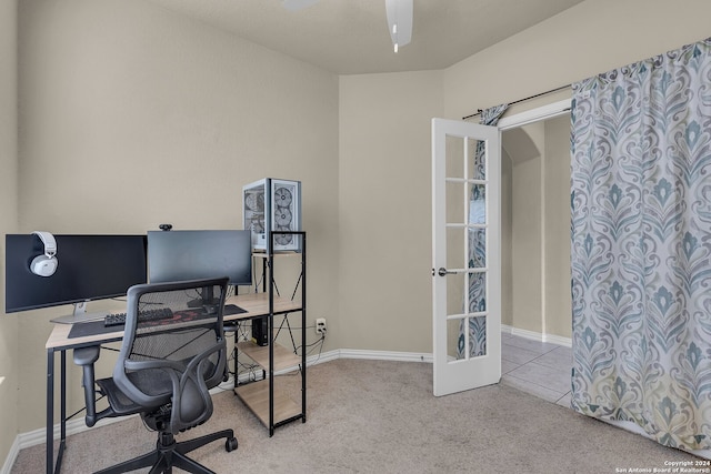 carpeted office featuring french doors