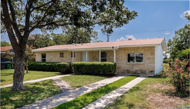 single story home with a front yard