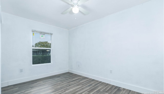 empty room with hardwood / wood-style flooring and ceiling fan