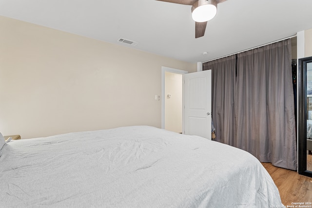 bedroom featuring ceiling fan and light wood-type flooring