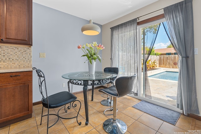 view of tiled dining space