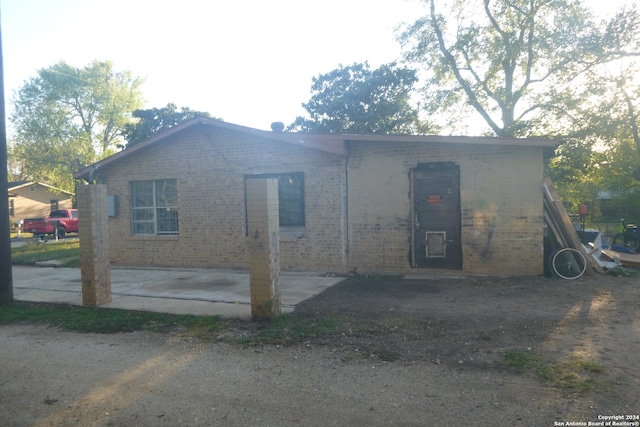 exterior space with a patio area