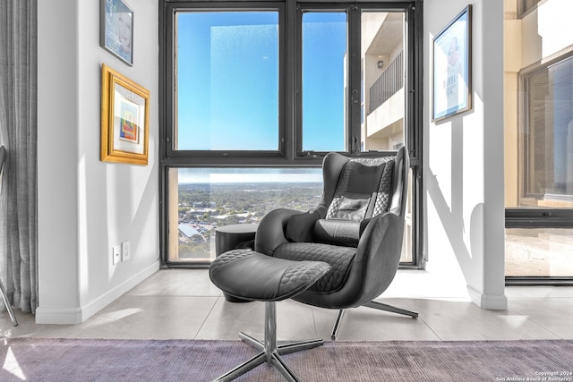 sitting room featuring concrete floors