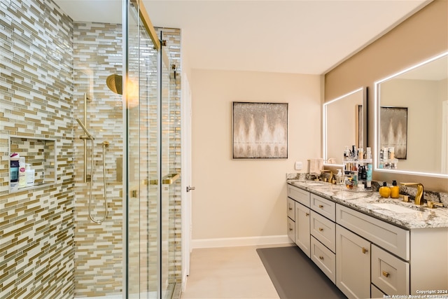 bathroom with vanity and walk in shower