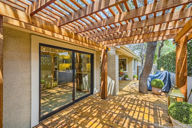 view of patio featuring a pergola