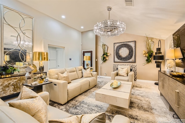 living room with an inviting chandelier