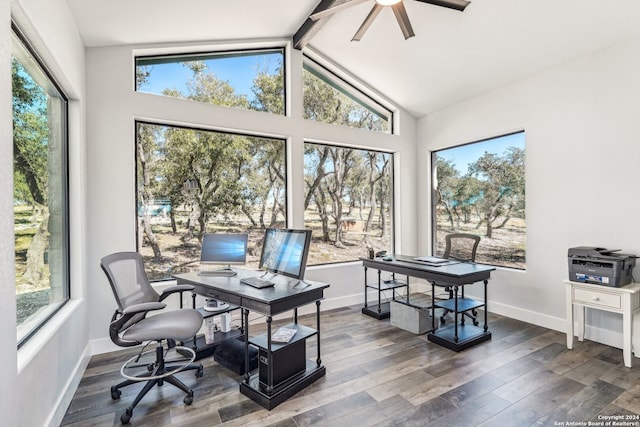 home office with a healthy amount of sunlight, wood-type flooring, beam ceiling, and high vaulted ceiling