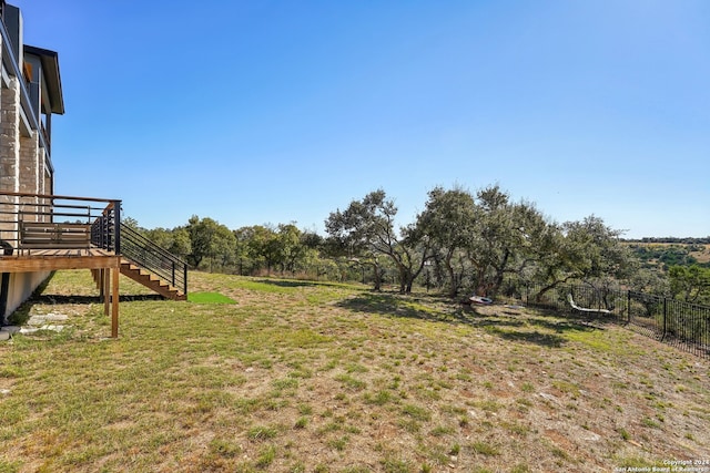 view of yard featuring a deck