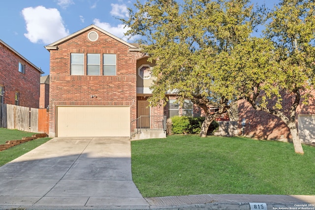 front of property with a garage and a front lawn