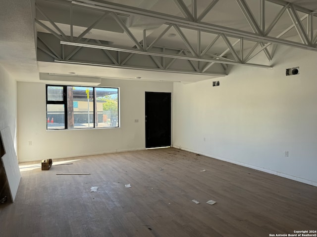 empty room with wood-type flooring