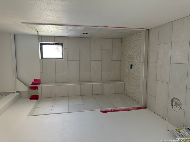 bathroom featuring concrete flooring