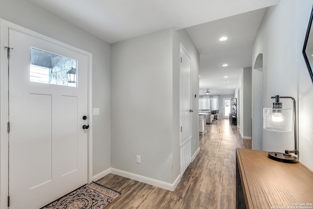 entryway with ceiling fan and hardwood / wood-style floors