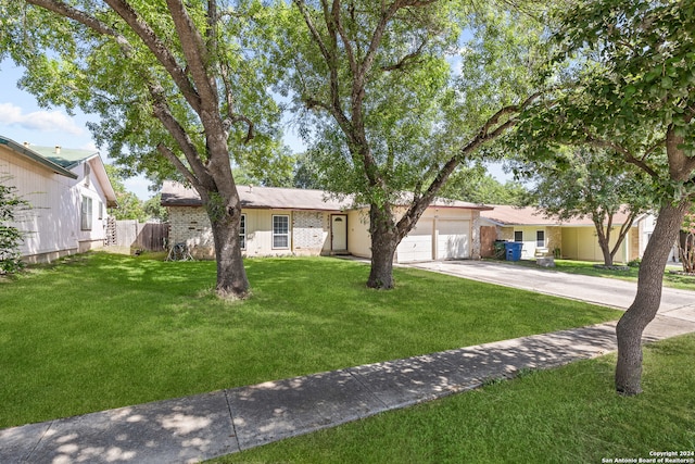 ranch-style house with a front yard and a garage