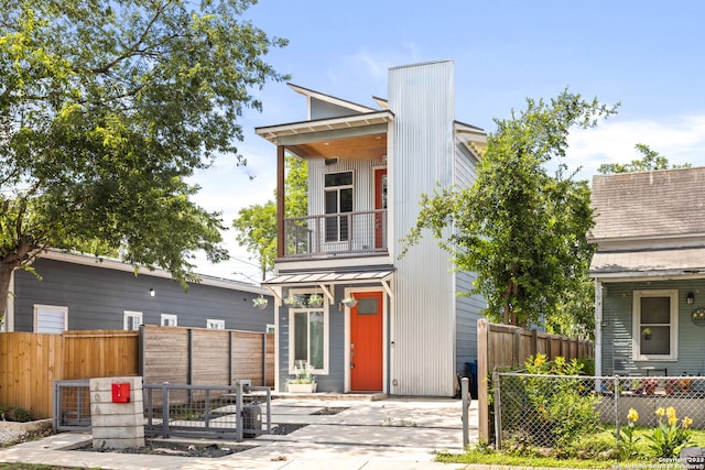 modern home featuring a balcony