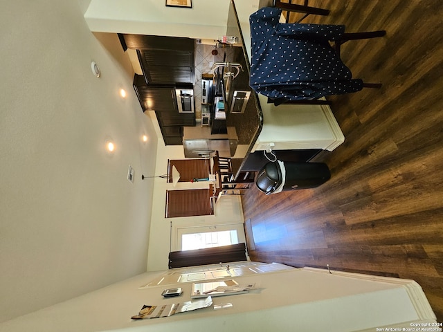 kitchen featuring wood walls