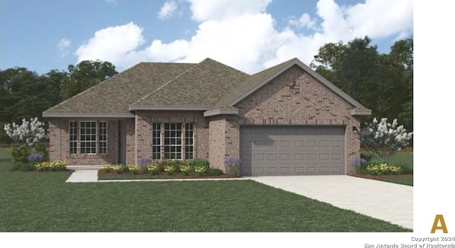 view of front of home featuring a front yard and a garage