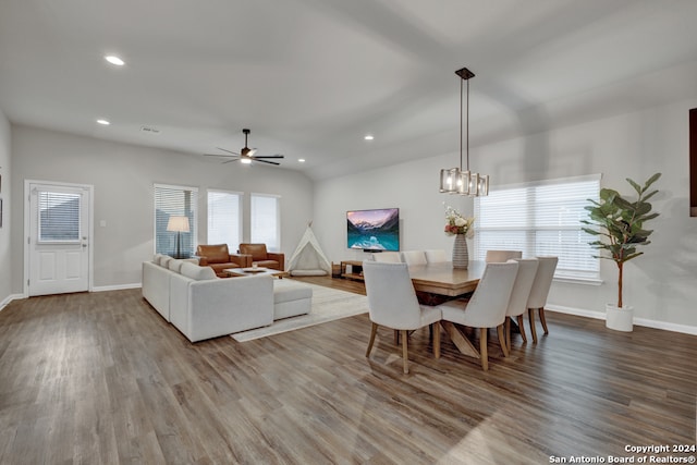 dining space featuring ceiling fan and wood-type flooring