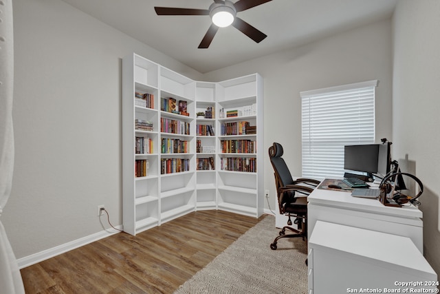 office featuring light wood-type flooring and ceiling fan