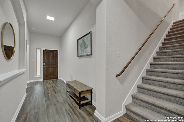 foyer entrance featuring hardwood / wood-style flooring