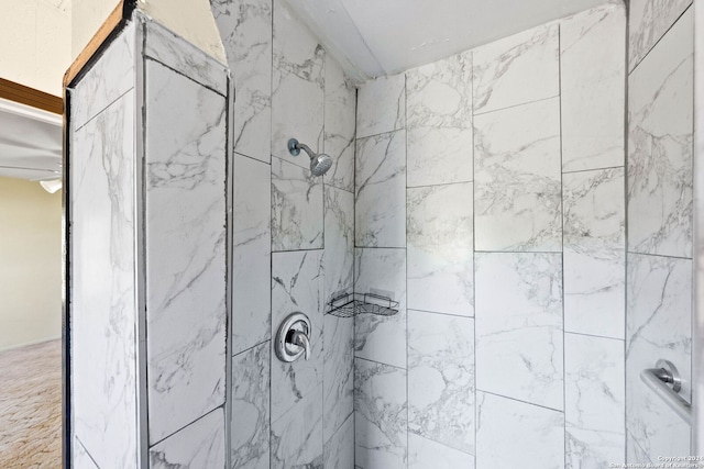 bathroom featuring a tile shower