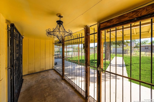 view of gate featuring a lawn