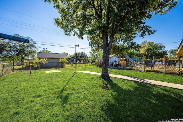 view of yard with a playground