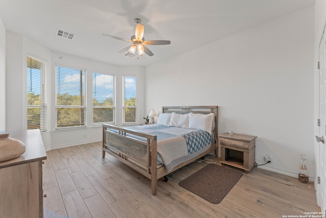 bedroom featuring ceiling fan and light wood-type flooring