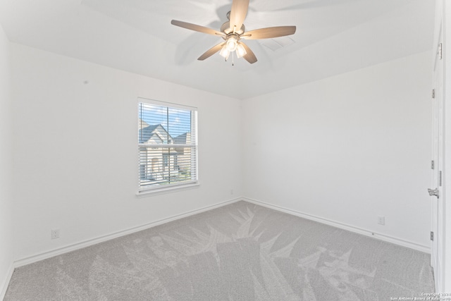 carpeted empty room with ceiling fan