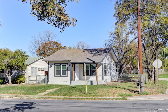 bungalow with a front lawn