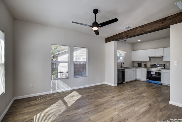 kitchen with white cabinets, black dishwasher, stainless steel electric range oven, and a wealth of natural light