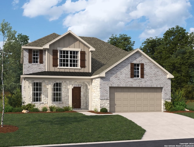 view of front facade featuring a front yard and a garage