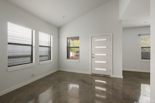 entryway with vaulted ceiling