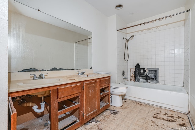 full bathroom with vanity, toilet, and tiled shower / bath