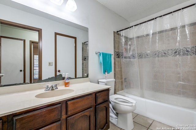 full bathroom with tile patterned floors, a textured ceiling, toilet, vanity, and shower / tub combo