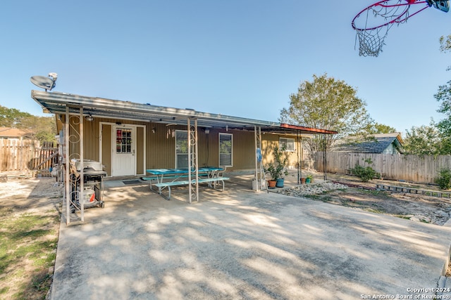 back of property featuring a patio area