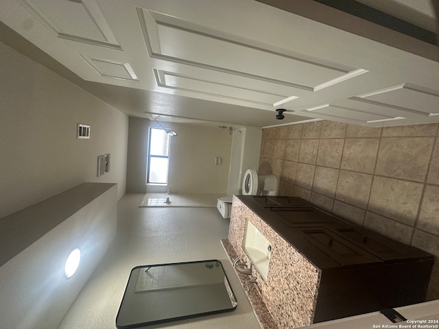 kitchen with tile walls