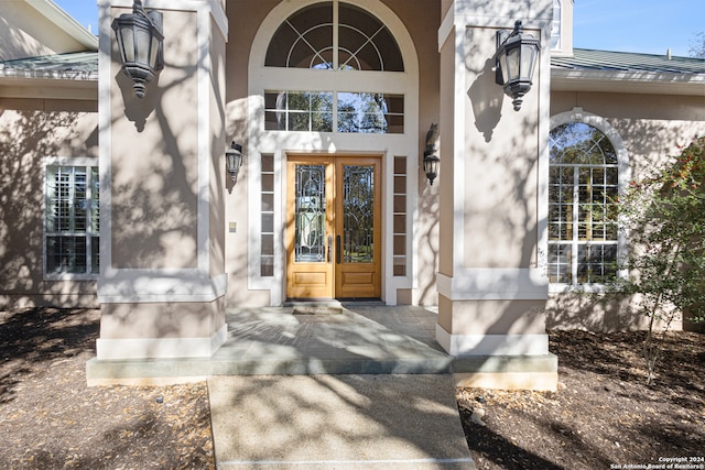 doorway to property featuring french doors