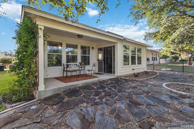 rear view of house featuring a patio area