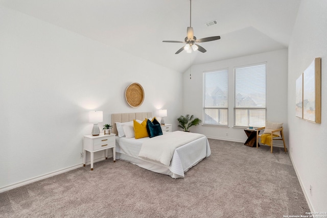 carpeted bedroom featuring ceiling fan and lofted ceiling