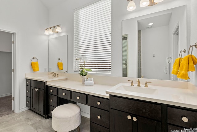 bathroom with vanity and an enclosed shower